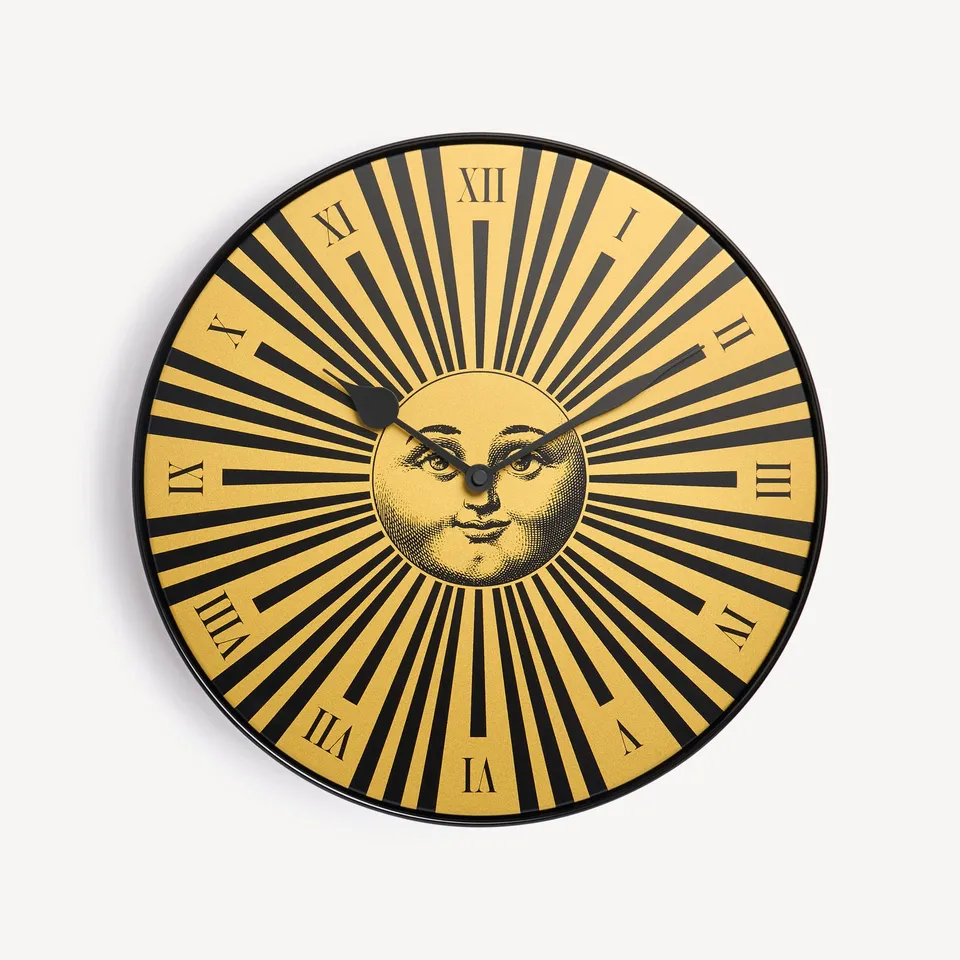 fornasetti-sole-raggiante-wanduhr-gold-metall-lautlos image 1