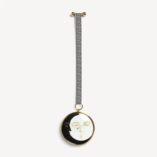 atelier-fornasetti-giorno-e-notte-wanduhr-messing-mit-schleife image 1