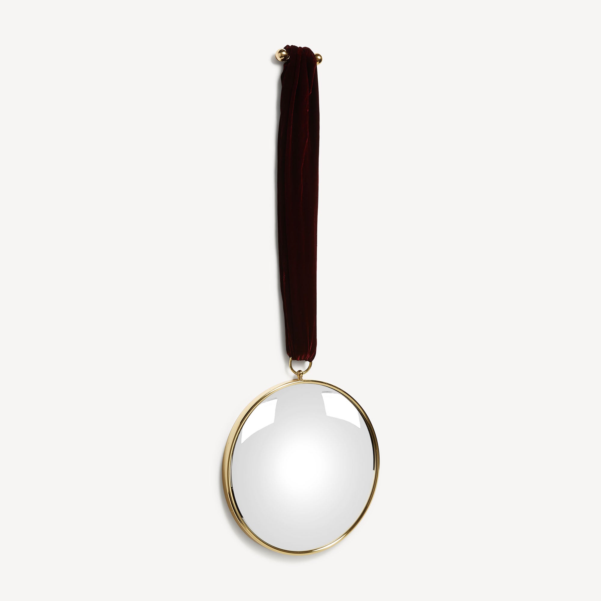 fornasetti-magic-konvexspiegel-messing-mit-samtband-2 image 2