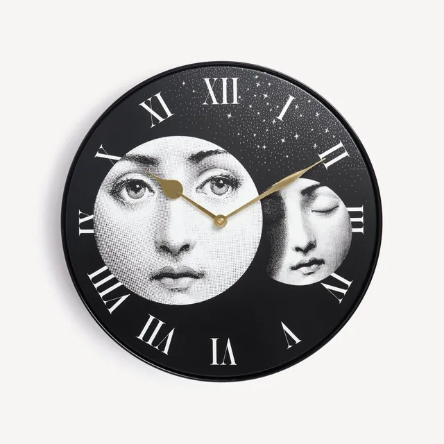 fornasetti-eclissi-wanduhr-metall-lautlos-lina-cavalieri image 1