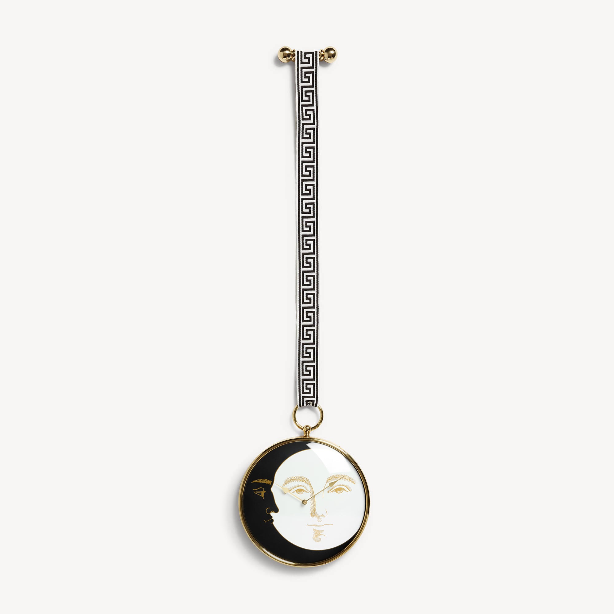atelier-fornasetti-giorno-e-notte-wanduhr-messing-mit-schleife image 1