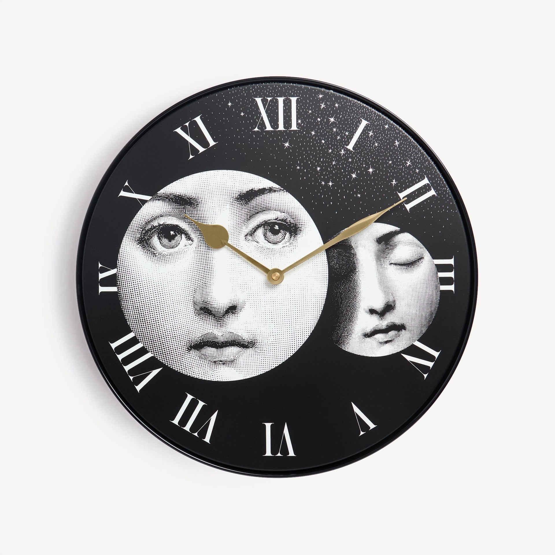 atelier-fornasetti-eclissi-wanduhr-metall-lina-cavalieri-motiv image 1