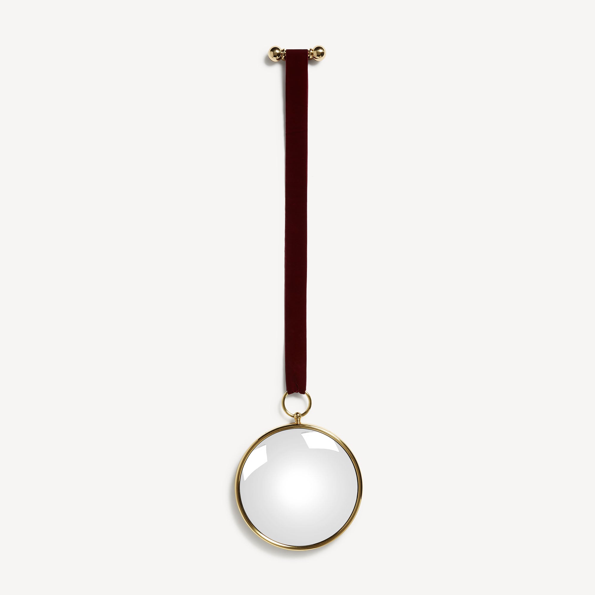 fornasetti-magic-konvexspiegel-messing-mit-samtband image 1