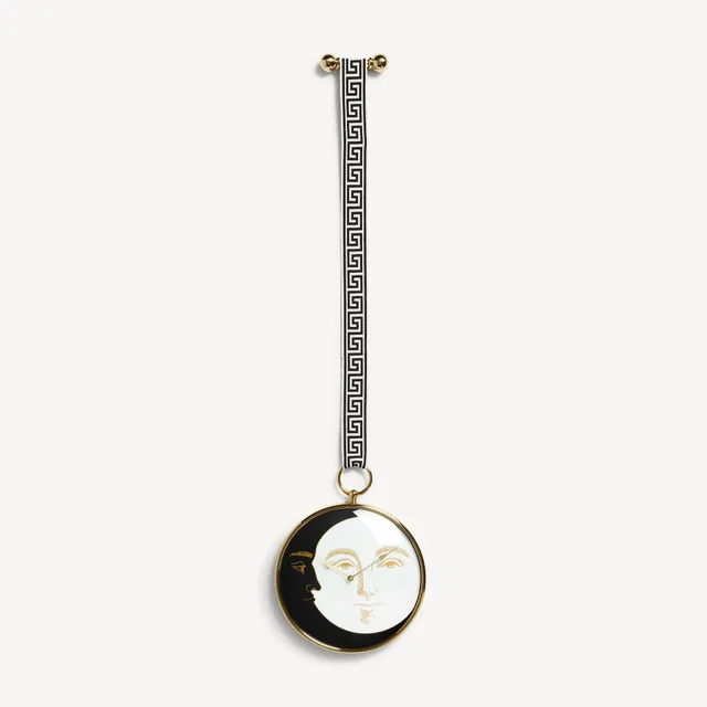 atelier-fornasetti-giorno-e-notte-wanduhr-messing-lautlos image 1